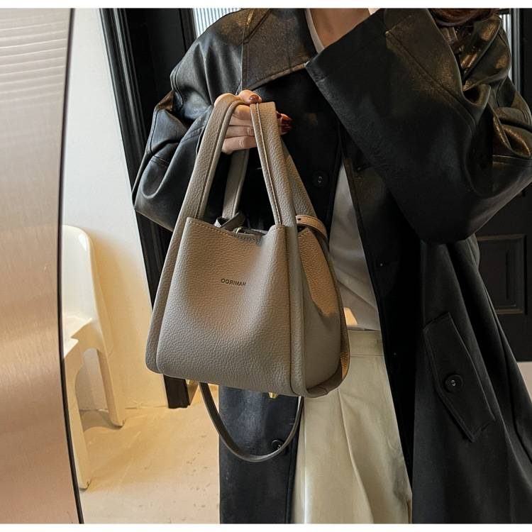 Zweiteilige, weiche Schultertasche mit Litschi-Muster für Mütter im Außenhandel. Neue, lässige, einfache, tragbare diagonale Tasche für das Leben._voghion.com