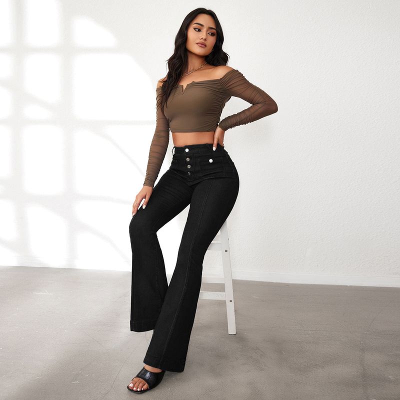 Abbigliamento da donna Jeans bootcut elasticizzati slim fit a vita alta con bottoni - Comodi e lusinghieri Jeans bootcut elasticizzati slim fit a vita alta_voghion.com