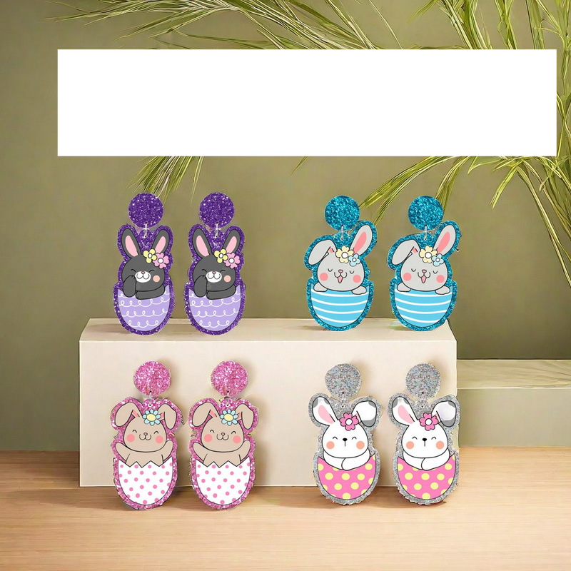 Orecchini per anziani con fiori primaverili e uova di Pasqua. Gli orecchini possono essere realizzati come portachiavi, accessori per collane._voghion.com
