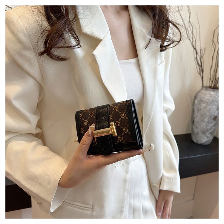Damentaschen Geldbörse Kartenhalter Boutique Schloss Retro High-End Randdruck Dreifach gefalteter Kartenhalter mit mehreren Positionen Geldbörse mit großer Kapazität_voghion.com