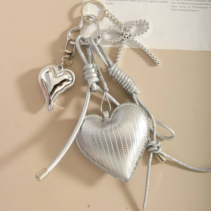 Portachiavi con fiocco a forma di cuore in PU argento di lusso - Accessorio alla moda per borse e portafogli, regalo perfetto per donne e ragazze_voghion.com