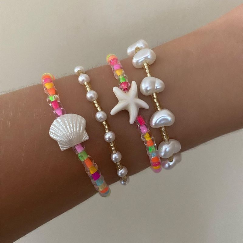 Braccialetti d'oro Bracciale d'oro Set di conchiglie a stella marina bohémien Bracciale di perle colorate da spiaggia estiva_voghion.com
