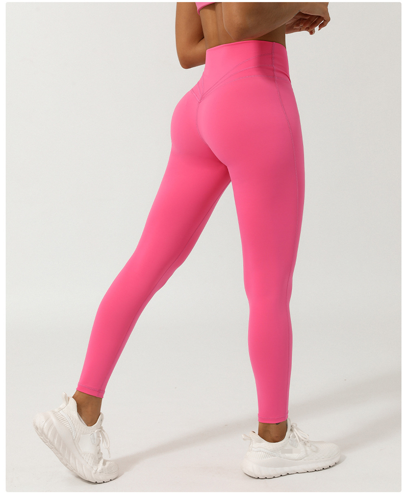 Women's Nude Cross V-shaped Nine Point Yoga Pants Without T-line Peach Hip Lifting Quick Drying Sports Pants_voghion.com