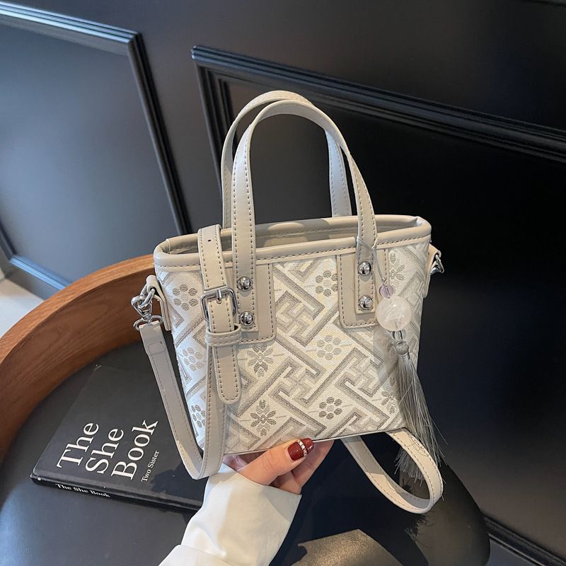 Borsa a secchiello a mano con tracolla versatile color-block, piccola e squisita, super popolare per le donne, tendenza estiva 2025_voghion.com