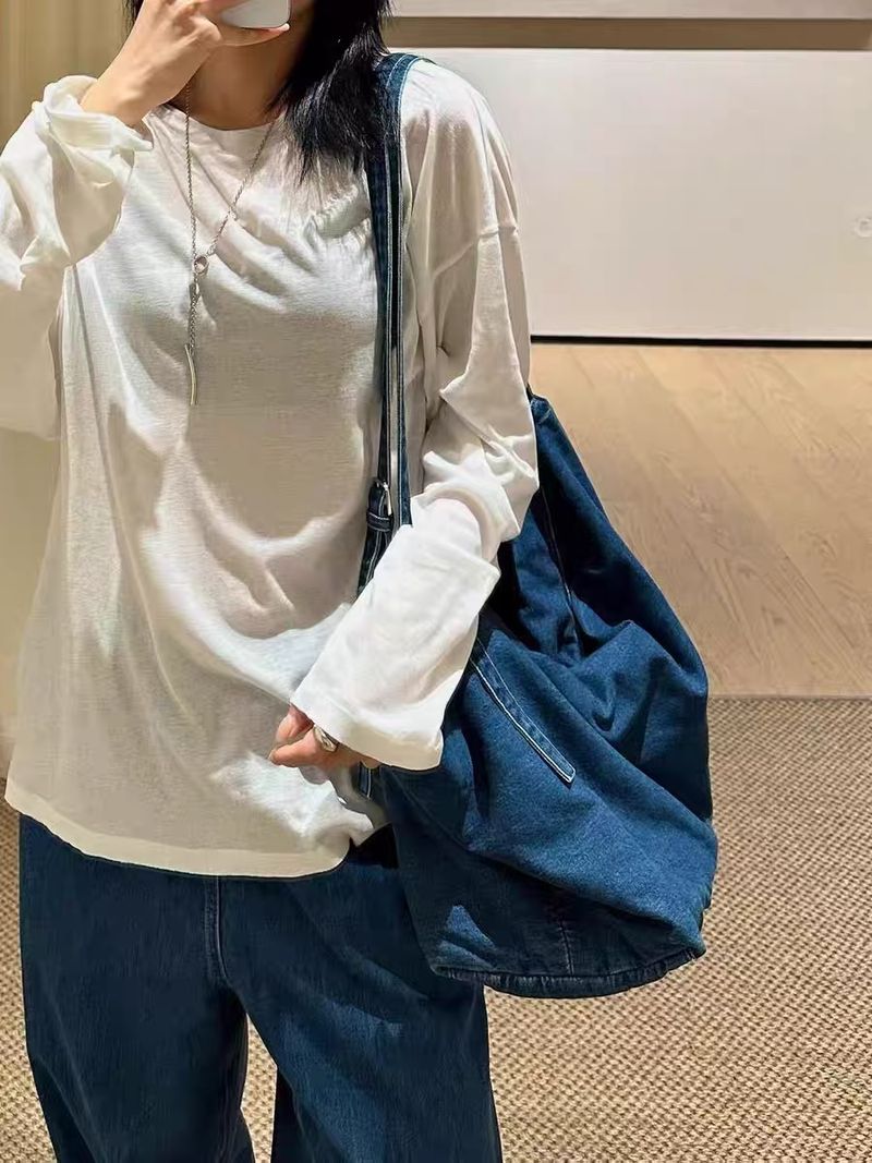 Nuova ondata di moda, borsa a tracolla in denim versatile dal design minimalista_voghion.com