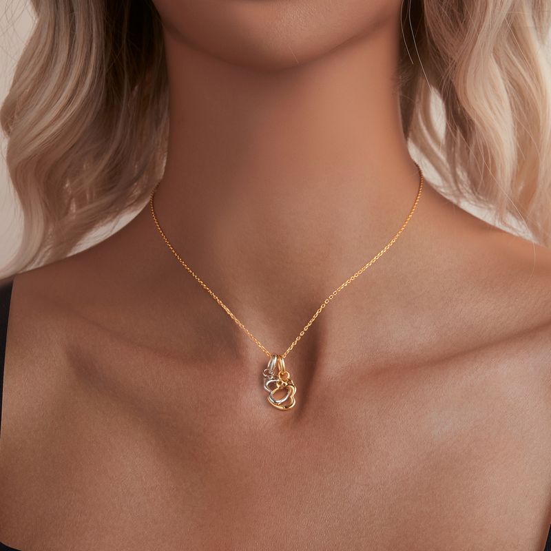 Ciondolo a forma di manetta a forma di cuore in argento sterling_voghion.com