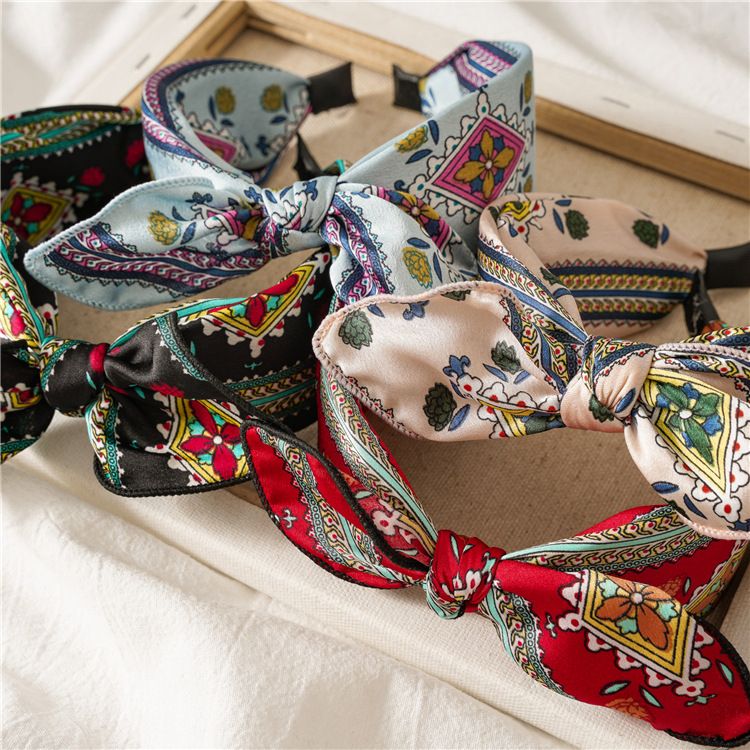 Leopard print rabbit ears knotted wide version headband female European and American going out disc hair card headband jewelry_voghion.com