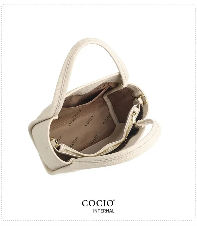 Borsa a tracolla versatile da portare a mano per l'estate, firmata COCIO, con caratteristiche multifunzionali e di alta qualità._voghion.com