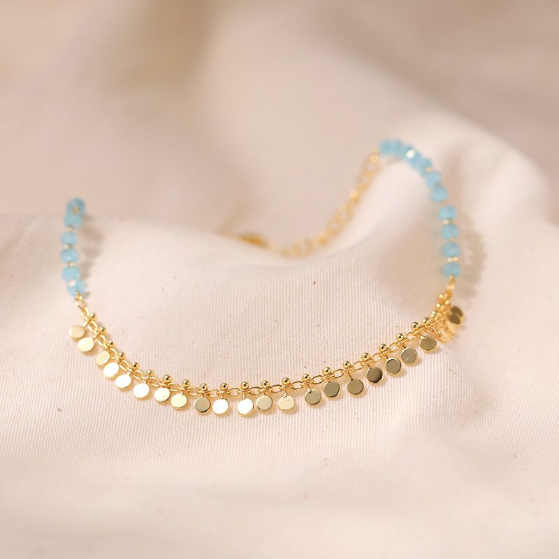 Cavigliera con ciondolo a forma di nappa in vero oro placcato in ottone esotico, cavigliera con cristallo azzurro e temperamento elegante_voghion.com