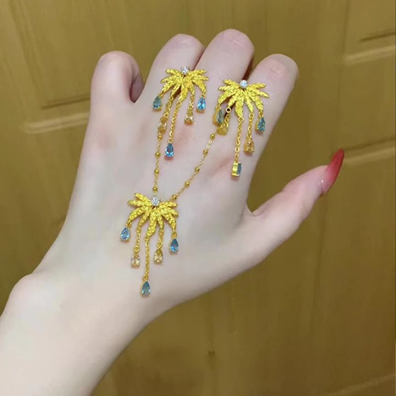 Orecchini a bottone con nappe e fuochi d'artificio in oro di nicchia unici 2025, nuovi e squisiti, dal temperamento raffinato, per donne, alla moda e di alta qualità._voghion.com