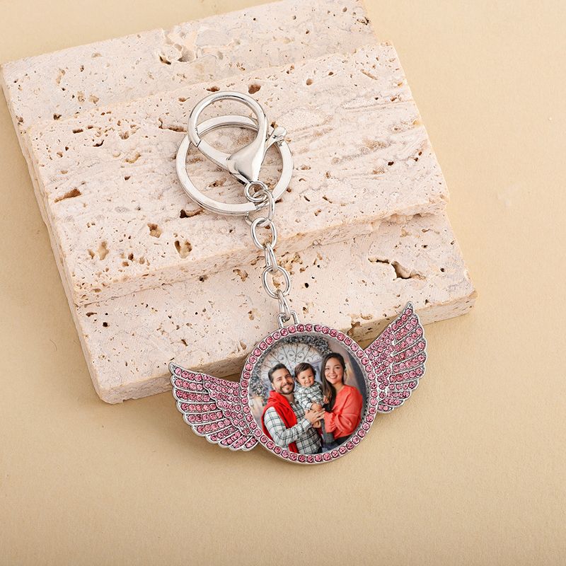 Portachiavi alla moda in stile hip hop con ala e strass: accessorio fai da te unico per uomini e donne (argento, diamante nero/rosa/bianco/blu)_voghion.com