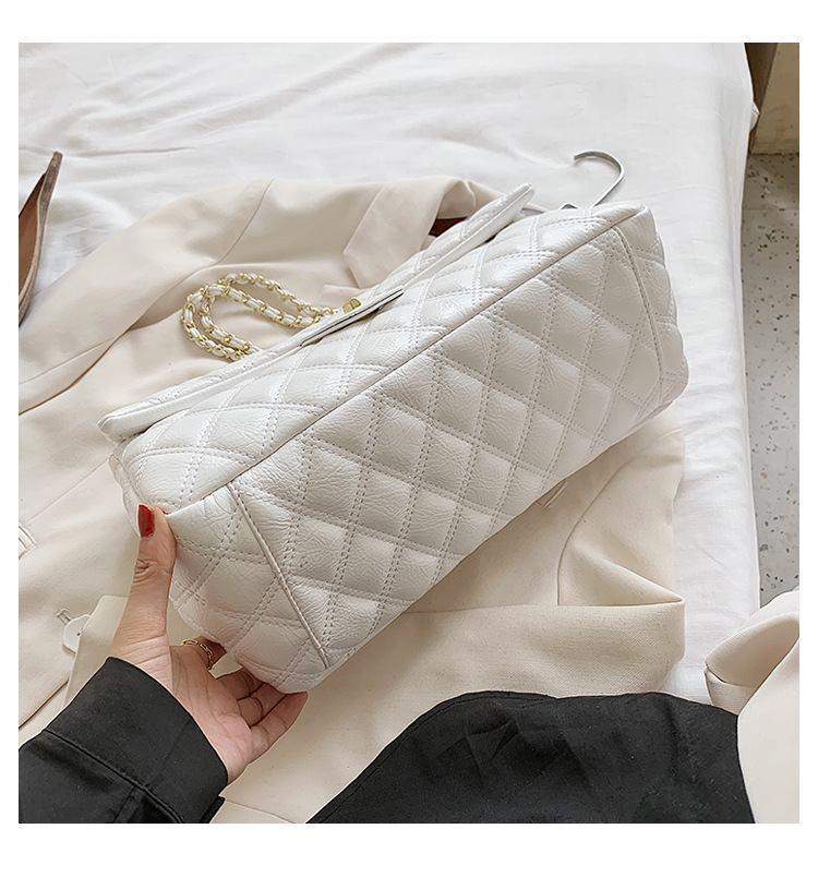 Texture di nicchia in stile designer con un tocco avanzato, piccola borsa con catena a griglia Xiangling, borse da donna trendy con tracolla diagonale a spalla singola_voghion.com