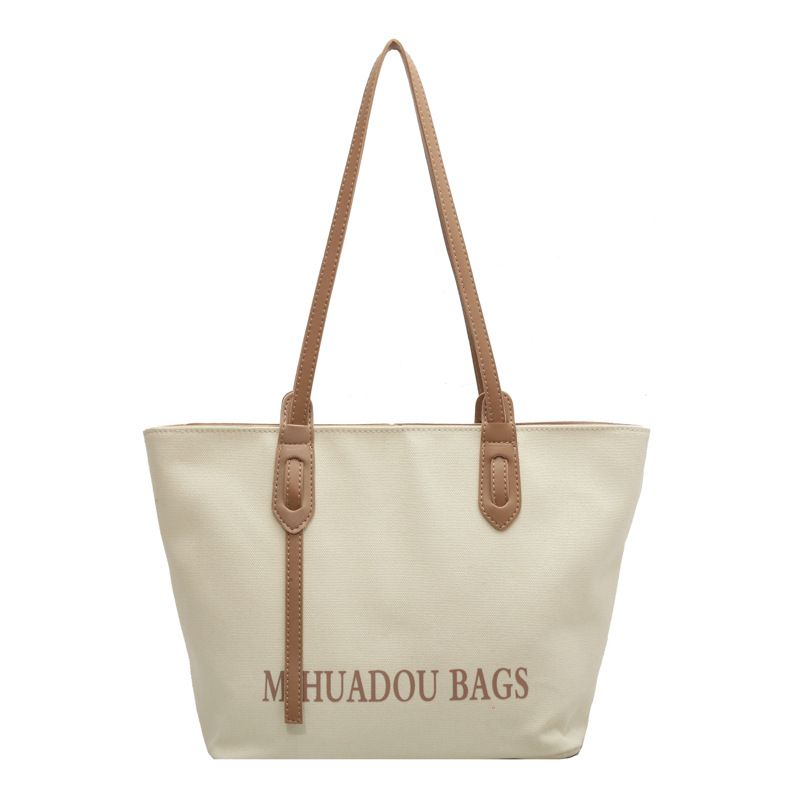 Canvas Large Women 2025 Spring New High-end Fabric Handheld Shoulder Bag For Class And Commute Tote_voghion.com