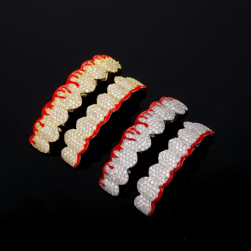 Grillz unisex natalizi in oro e argento con design a fiamma e diamante - Perfetti per Halloween, cosplay e moda_voghion.com
