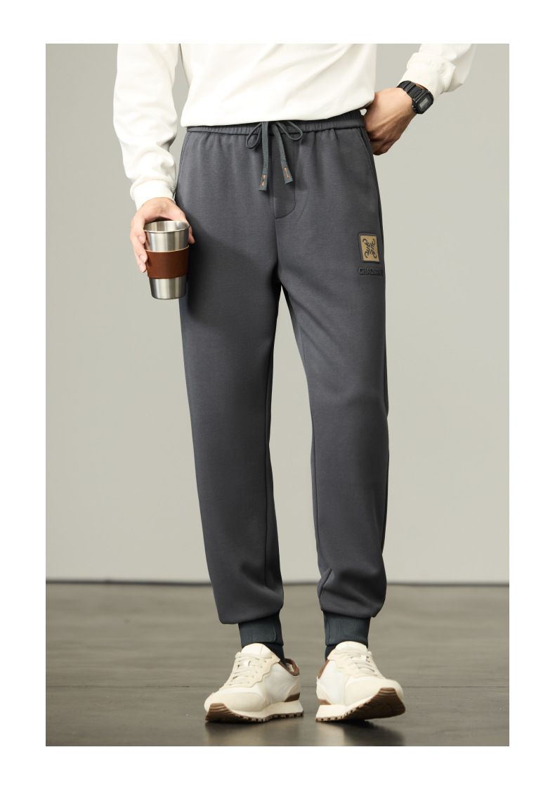 Pantalones deportivos de punto grueso premium con puños a rayas: corte holgado, cómodos y elegantes para hombre._voghion.com