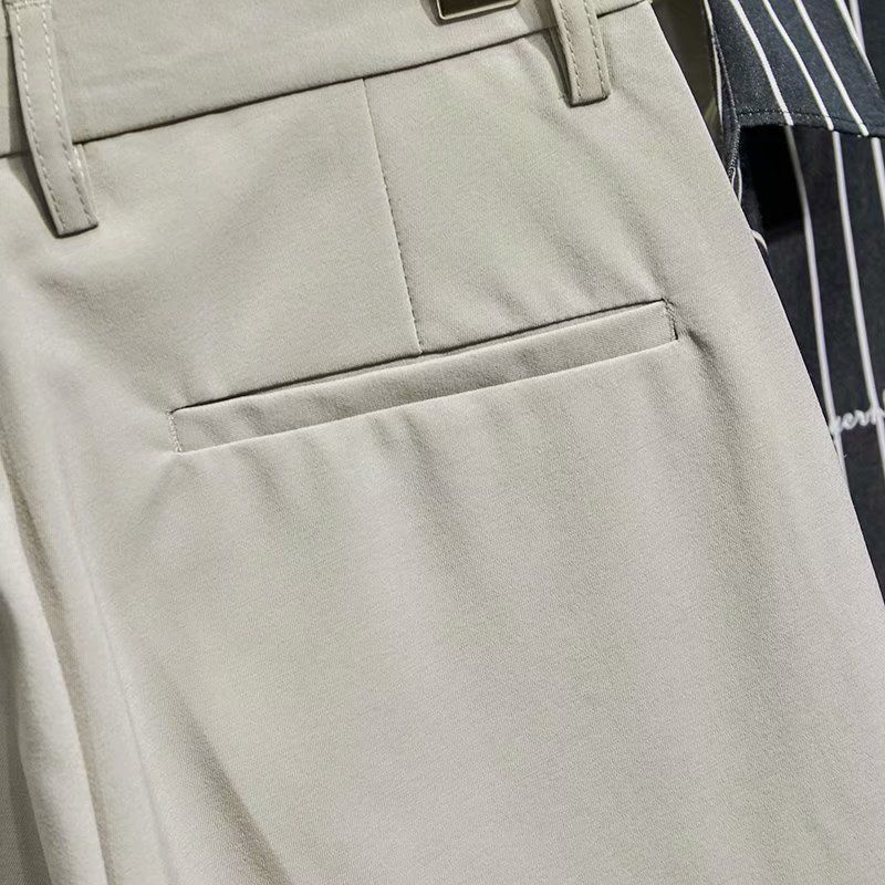 Pantaloni da uomo di design con lo stile di Hong Kong che entra nella moda, pantaloni a gamba dritta per la perdita di peso, pantaloni western drappeggiati casual e alla moda._voghion.com