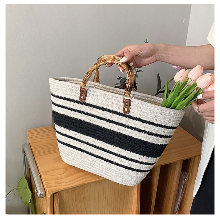 Gestreifte große Kapazität Stroh Persönlichkeit Casual Urlaub Strand Frauen Nischendesign Bambus Griff Tasche Taschen_voghion.com