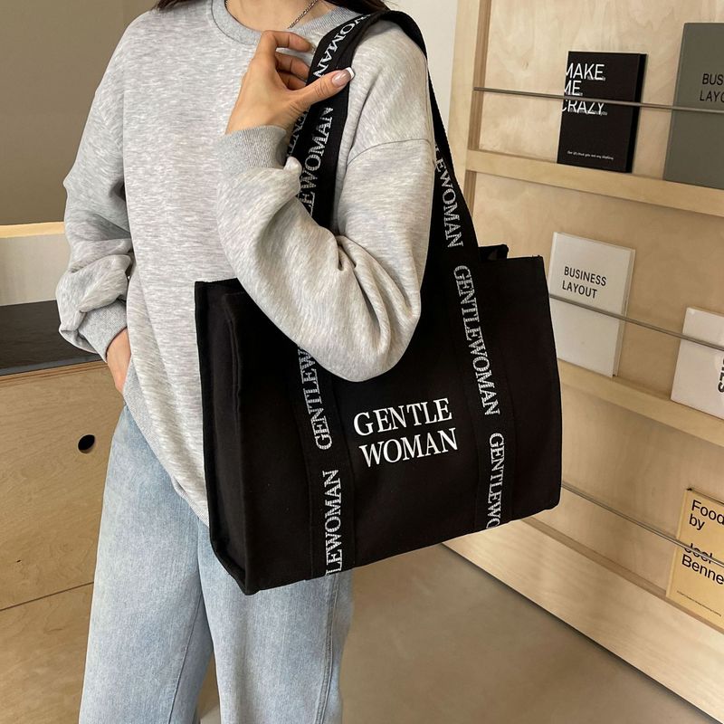 Large capacity canvas for women 2024 new fashionable letter class commuting handbag simple casual shoulder bag_voghion.com