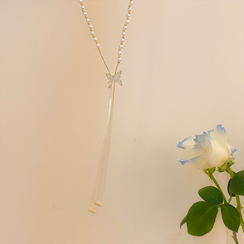 Pearl necklace for women, necklace design, niche butterfly tassel pendant, clavicle chain 2023 new_voghion.com