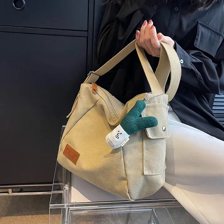 Bolsa transversal feminina de lona, estilo coreano, com alça média, modelo Y2K Harajuku Ita School Textile Stray (código 241007)._voghion.com
