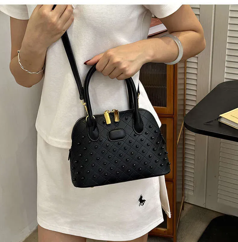 Fashion Designer Shell Bags For Women Elegant Rivet Handbag Versatile Large Capacity Shoulder Crossbody Bag_voghion.com