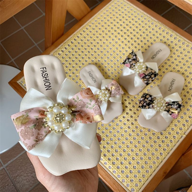 Koreanische Version Bogen Kinder Fee vielseitig Prinzessin Stil rutschfeste atmungsaktive Damen Sandalen Mädchen Hausschuhe im Freien_voghion.com