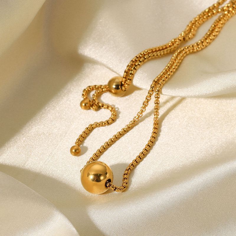 Collana con ciondolo a sfera in stile minimalista INS, catena estraibile, collana in acciaio inossidabile dorato, gioielli personalizzati da donna_voghion.com