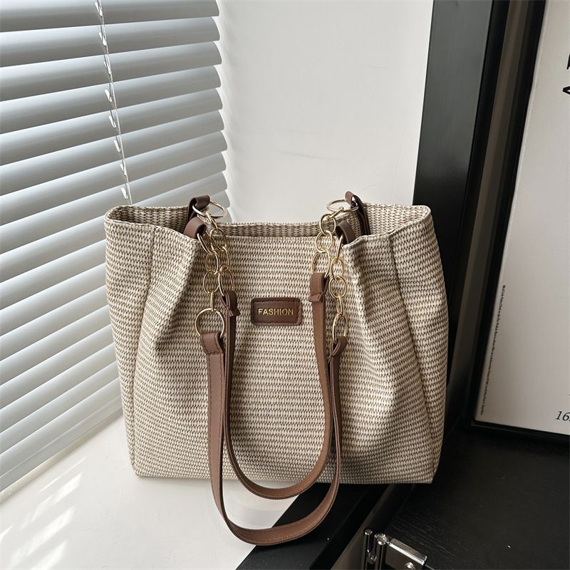 Borsa a tracolla da donna alla moda, nuova e semplice, primavera 2025, casual, con texture di nicchia, da portare sotto le ascelle_voghion.com