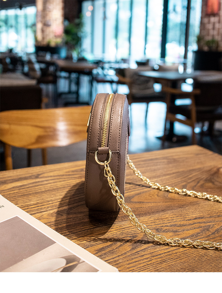 Borsa da donna per acquisti di Hong Kong 2023 Nuova borsa rotonda piccola retrò Borsa rotonda versatile Borsa a tracolla rotonda con catena_voghion.com