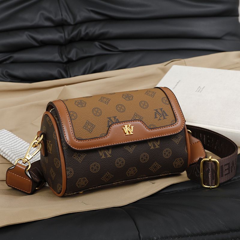 Nuova versione coreana 2025, versatile borsa a tracolla rotonda cilindrica stampata elegante da donna_voghion.com