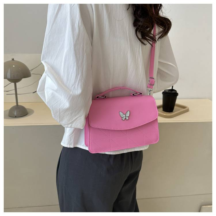 Fransk lyxig handväska i mild stil Butterfly Dekorativ liten väska Dam 2024 Sommar Ny västerländsk stil Crossbody-väska med en axel_voghion.com