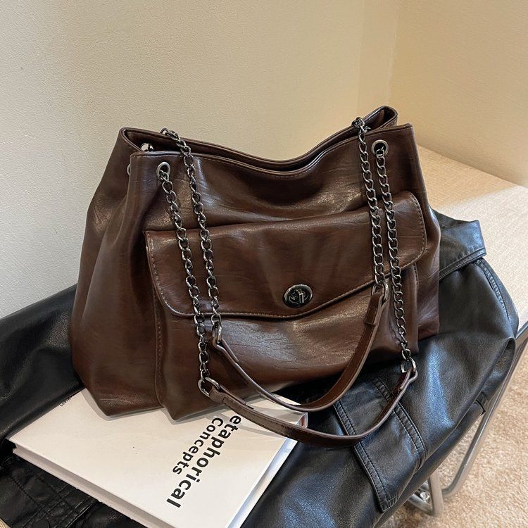Our women's bag is not just an accessory, but also a symbol of your confidence. Shoulder bag, zipper, stitching PU_voghion.com