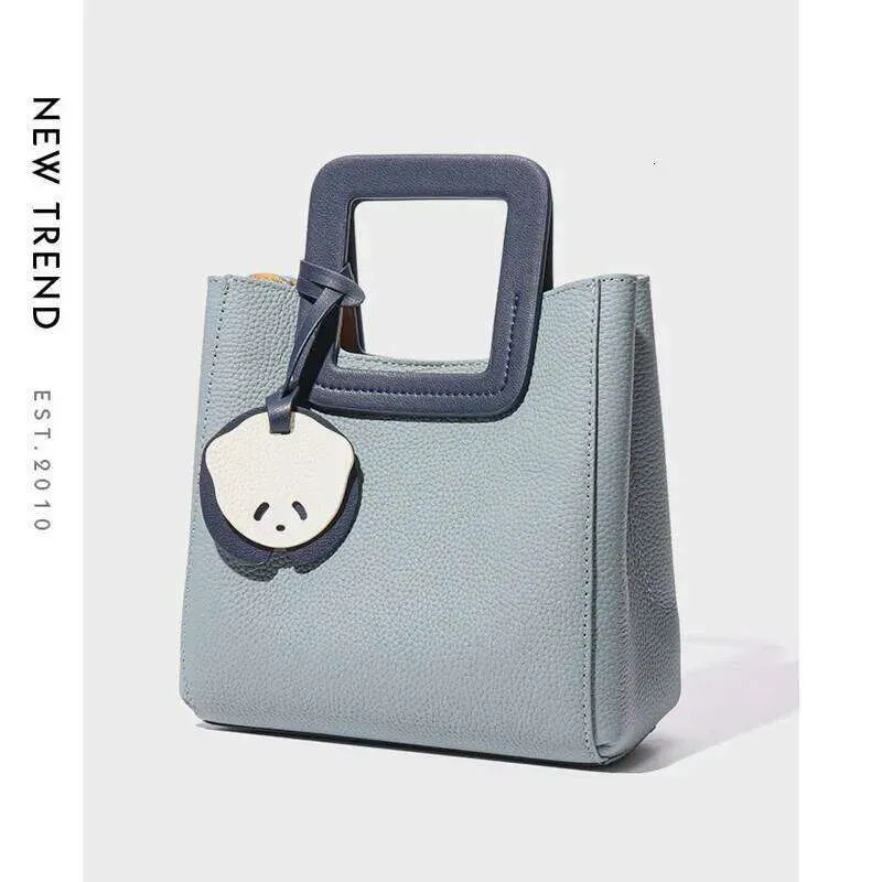 Borse Bella borsa da donna azzurra in vera pelle di mucca con manico quadrato, borsa tote casual da donna_voghion.com
