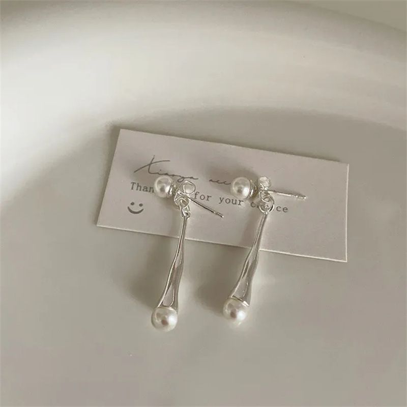 Perla a goccia d'acqua con ago d'argento, coppia di design creativo di personalità di nicchia, orecchini con uno stile fresco e lussuoso per le donne_voghion.com