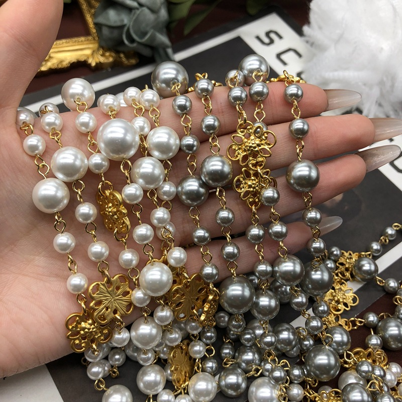 Niche de luxe légère automne et hiver multicouches pour femmes, chaîne de pull, collier de perles, design médiéval tendance, collier à chaîne suspendue haut de gamme_voghion.com