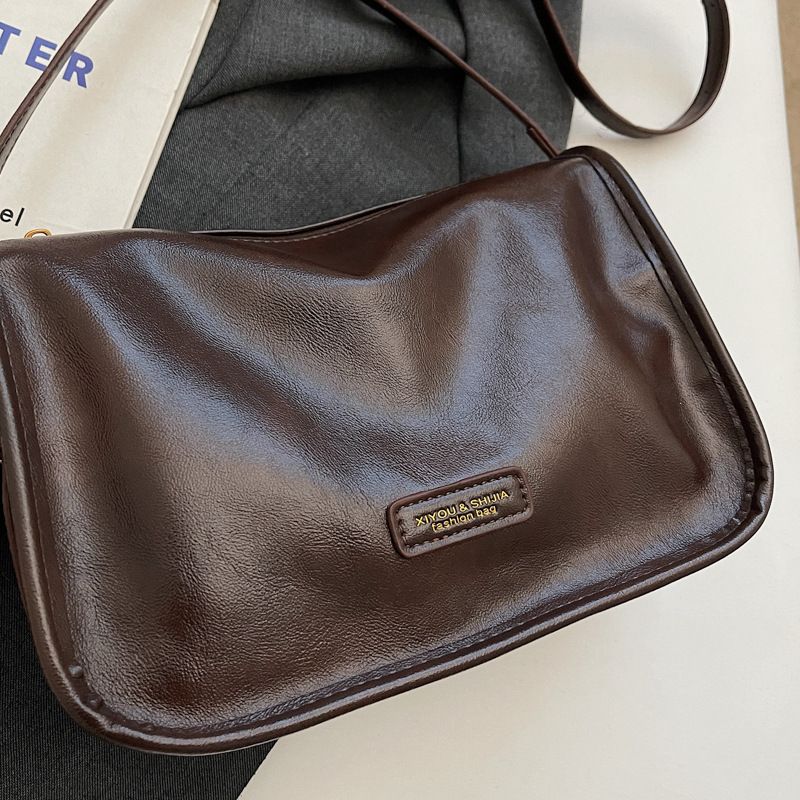Niche high-end crossbody pro ženy 2024 nová stylová všestranná polštářová denní dojíždění malá čtvercová kabelka_voghion.com