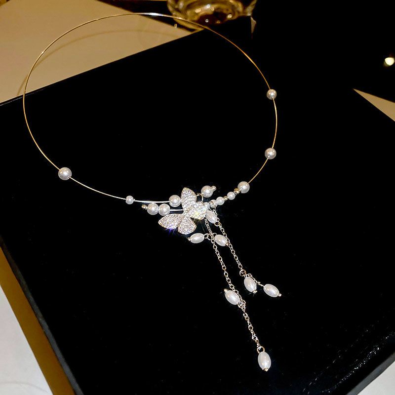 Collar de borlas de perlas y mariposa plateada para mujer, nuevo y popular gargantilla de alta gama de 2024_voghion.com