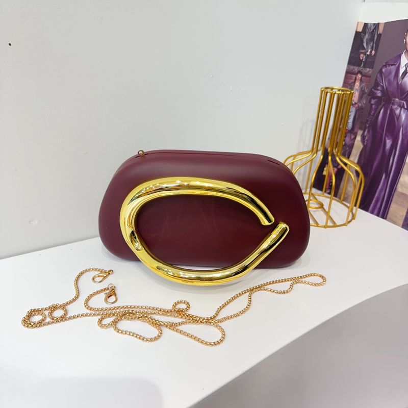 Borsa da sera classica alla moda con pochette rotonda in acrilico, manico in metallo, tracolla_voghion.com