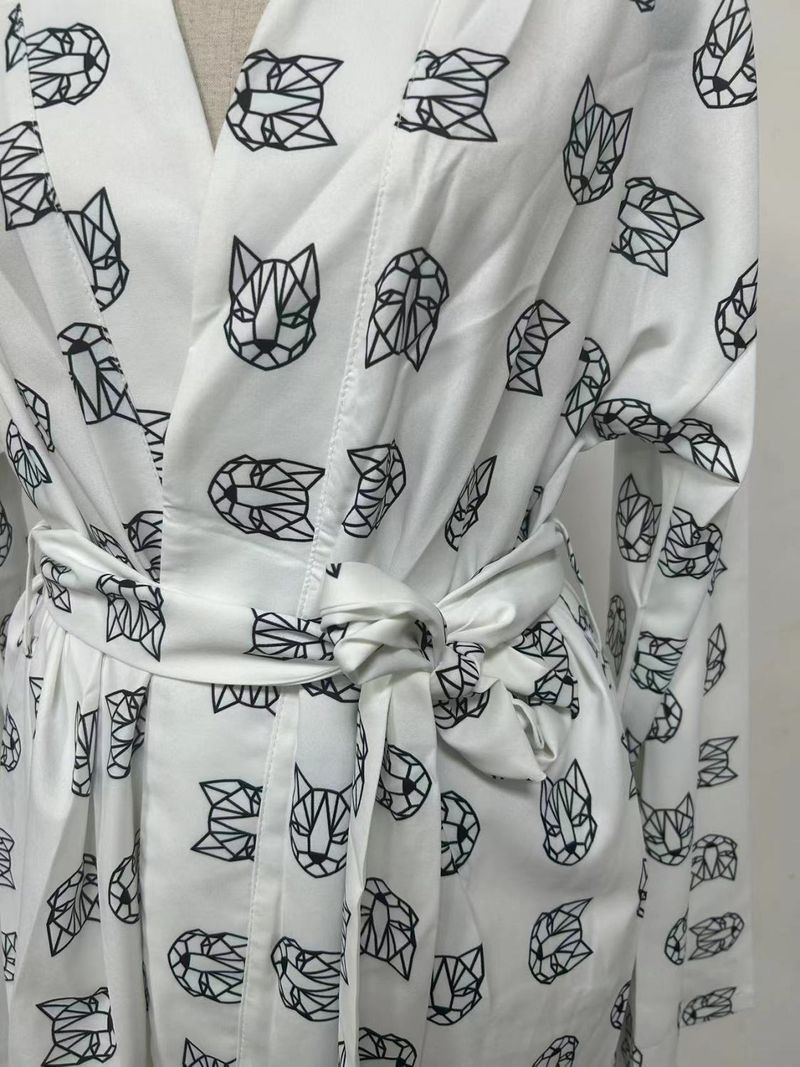 Completo da casa da donna composto da top e pantaloncini con scollo a V, stampati e allacciati, stile ampio_voghion.com