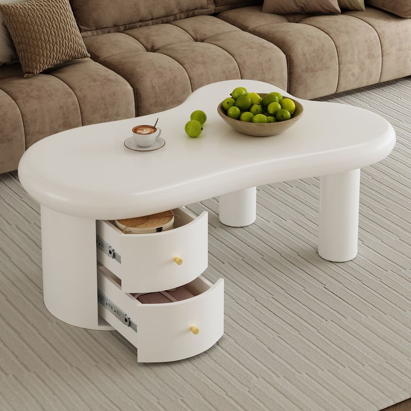 Table basse blanche moderne de forme irrégulière avec 2 tiroirs, design compact et élégant, robuste et pratique pour le salon et une utilisation polyvalente._voghion.com