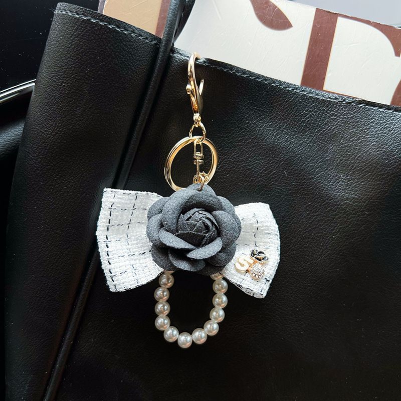 Personalized pearl chain, small fragrance bow, camellia creative and exquisite car keychain, bag decoration, female_voghion.com