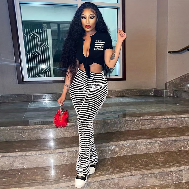 Pantaloni slim da donna a vita alta in maglia a righe_voghion.com