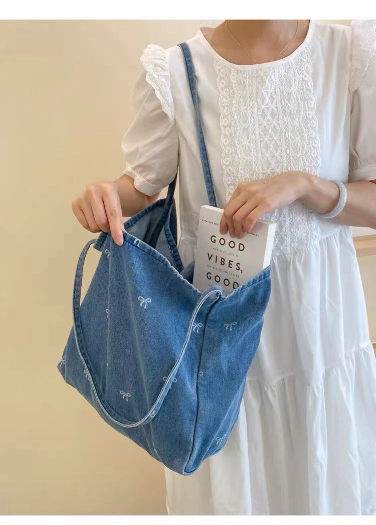Cowboy Shoulder Women's Multifunctional Large Capacity Washed Blue Canvas Bag_voghion.com