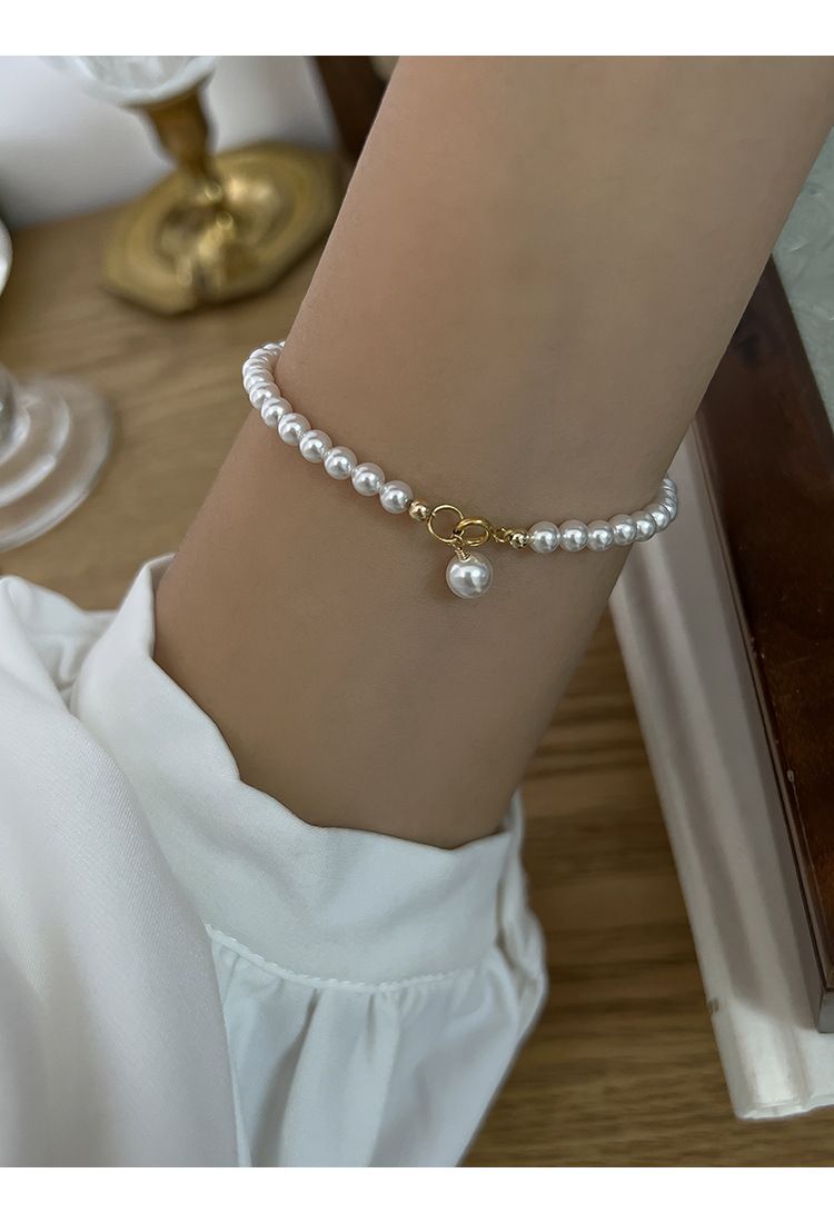 Braccialetto semplice con perle rotonde leggere e resistenti, classico Mini Shi Jia, stile squisito per i blogger di nicchia._voghion.com