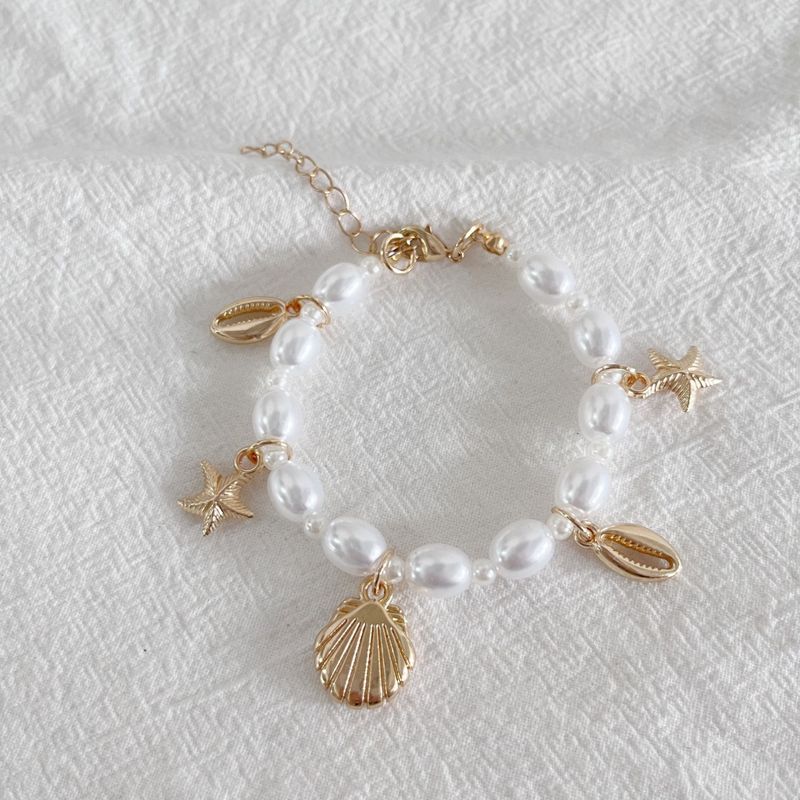 Bracciale da donna con conchiglia a forma di stella marina, in stile estivo, con perle irregolari e serie oceano, gioielli da spiaggia_voghion.com