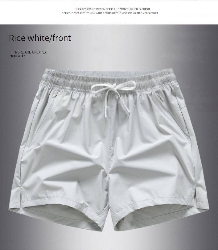 Men's Clothing Fashionable Beach Leisure Solid Color Quick Drying Loose Sports Shorts_voghion.com