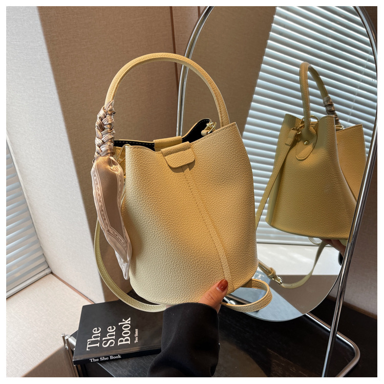 Trama di nicchia del designer, borsa a secchiello in tinta unita alla moda e versatile, borsa da donna portatile a tracolla diagonale con una spalla_voghion.com