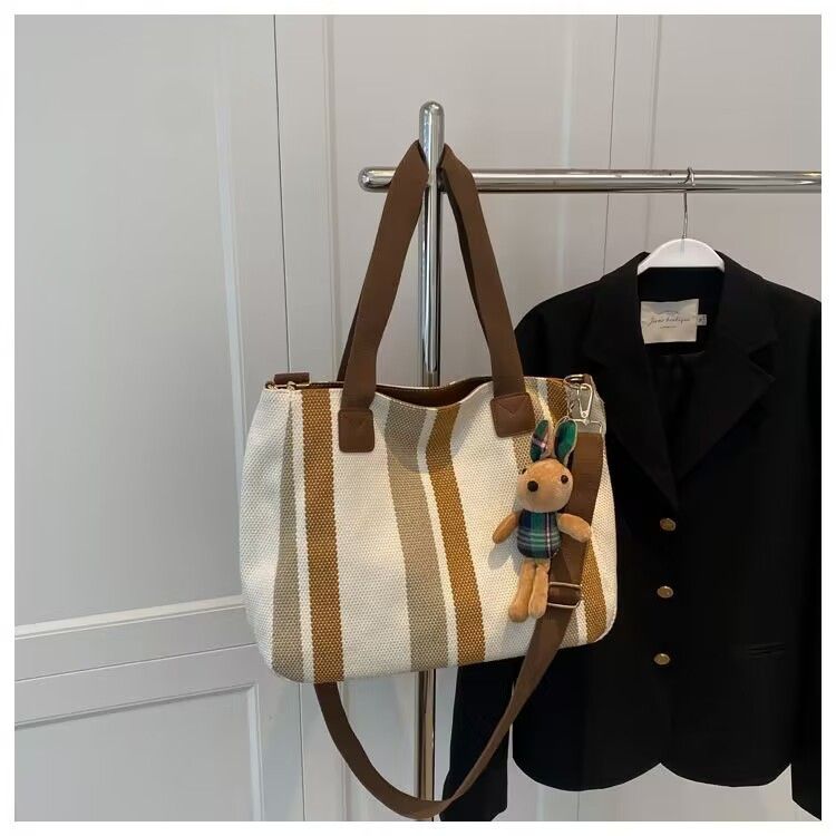 Neue trendige Umhängetasche, modische urbane Handtasche mit großer Kapazität und Canvas-Textur, einfache Pendler-Tragetasche_voghion.com