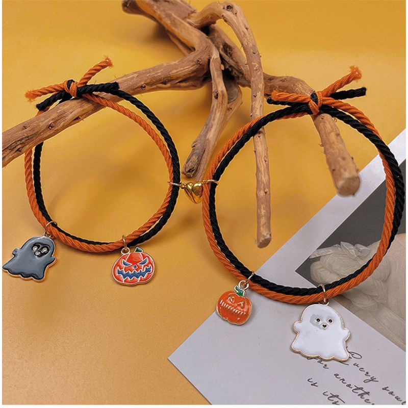 Het försäljning nya Halloween armband tecknad pumpa spöke hand med kärlek hjärta magnetisk par set hand rep_voghion.com