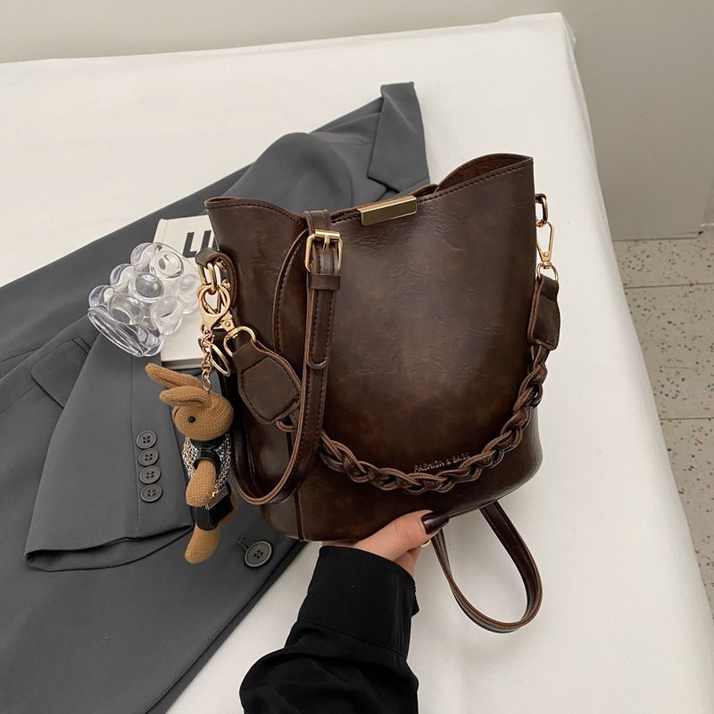 Pequena para mulheres 2025 Nova bolsa transversal versátil de alta qualidade com alça de mão_voghion.com